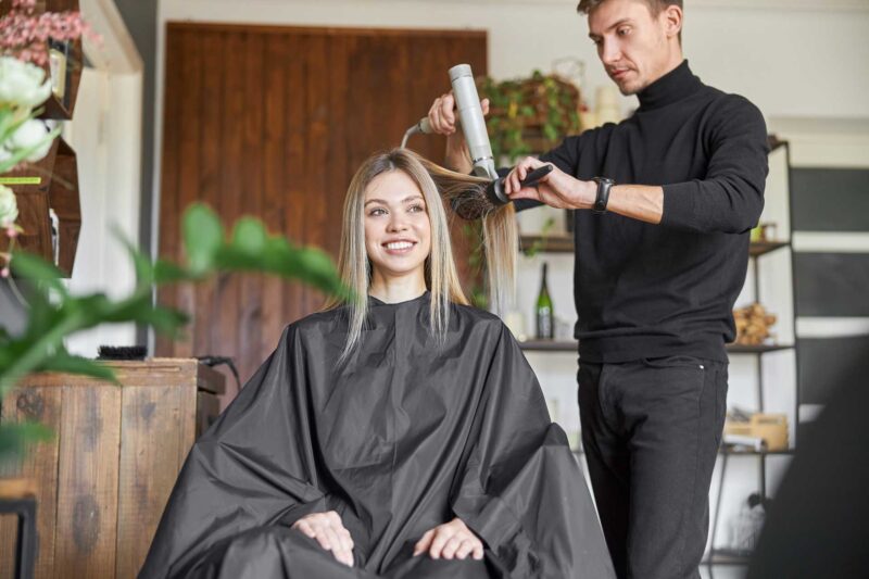 hair-drying-process-in-modern-hairdresser-s-salon-2024-10-18-08-09-56-utc
